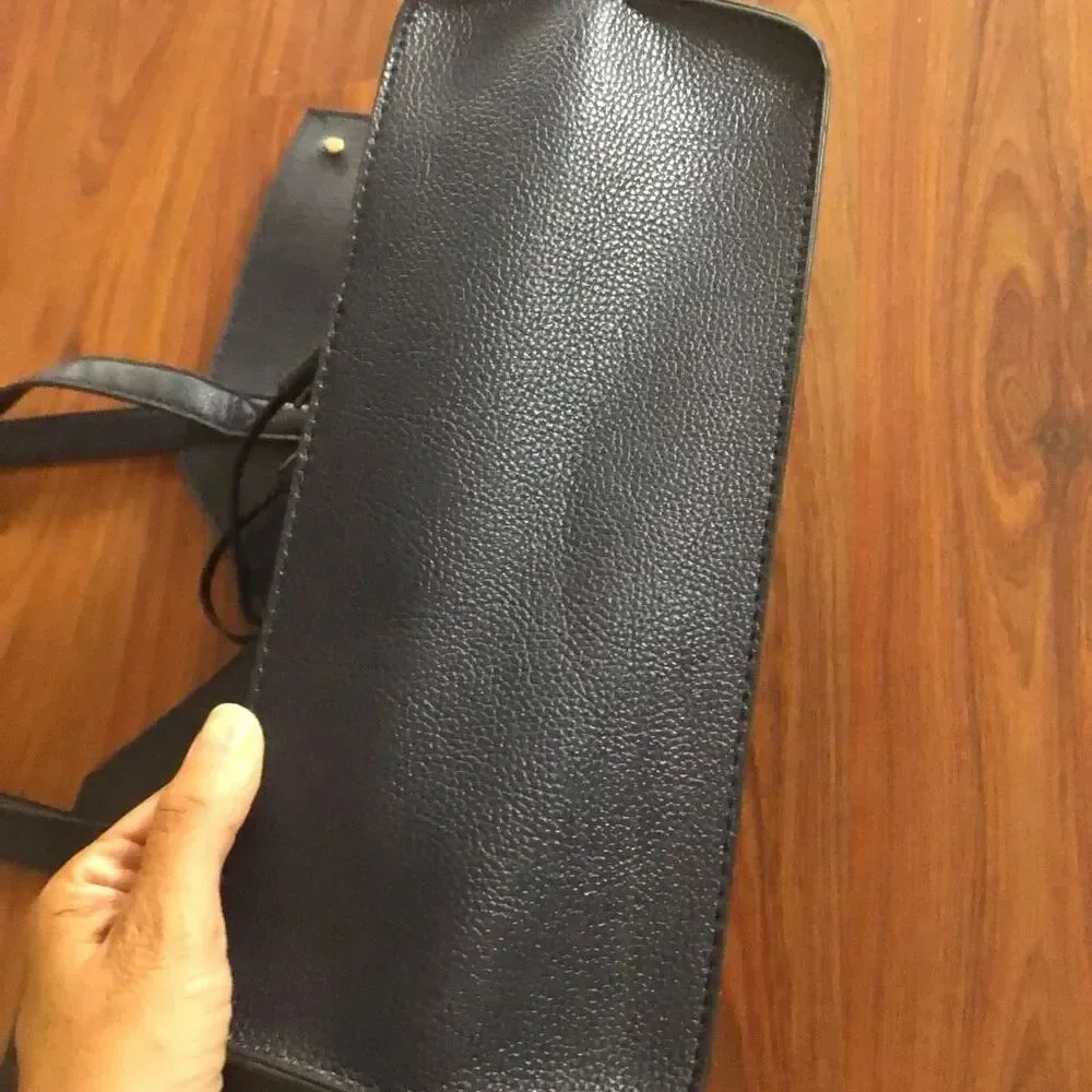 Neiman Marcus navy medium size tote with tassels